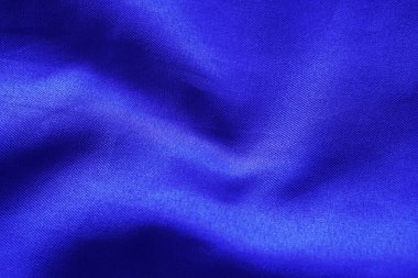 Mavi ipek kumaş arka plan, mavi spor giyim tarzı.