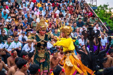 Bali, Indonesia - November 29, 2023: A cultural dance performance in Bali, Indonesia, showcasing traditional costumes and storytelling, surrounded by an engaged audience clipart