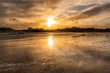 Sunset on the beach at Rhoscolyn Isle of Anglesey North Wales