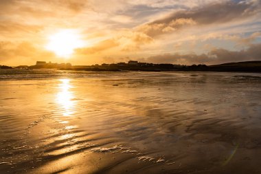 Sunset on the beach at Rhoscolyn Isle of Anglesey North Wales