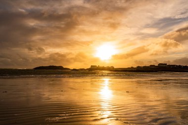 Sunset on the beach at Rhoscolyn Isle of Anglesey North Wales