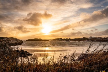 Sunset on the beach at Rhoscolyn Isle of Anglesey North Wales