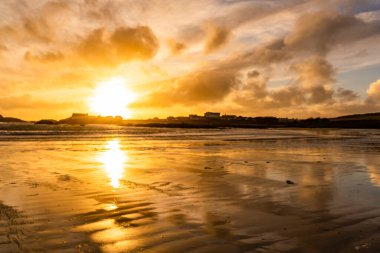Sunset on the beach at Rhoscolyn Isle of Anglesey North Wales