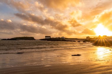 Sunset on the beach at Rhoscolyn Isle of Anglesey North Wales