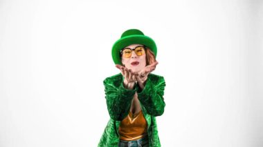 St. Patricks Day leprechaun model woman. Portrait of woman on Patricks Day celebration. White background