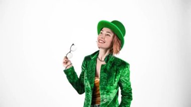 St. Patricks Day leprechaun model woman. Portrait of woman on Patricks Day celebration. White background