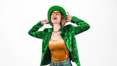 St. Patricks Day leprechaun model woman. Portrait of woman on Patricks Day celebration. White background