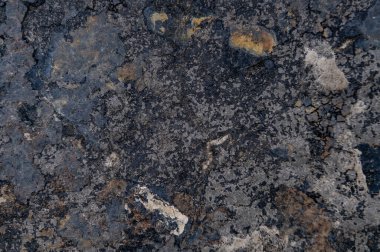 Arka plan olarak granit yüzey. Grunge taş dokusu. Bazalt. Kaya yüzeyi arkaplanı