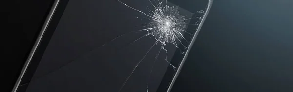 stock image Smartphone with a broken screen on a black background. Texture of broken glass with cracks. Abstract cracked smartphone screen from shock.