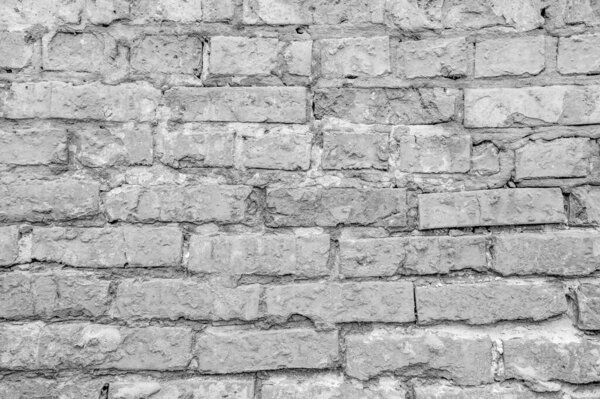 White brick wall. Detail of a white brick wall texture as background