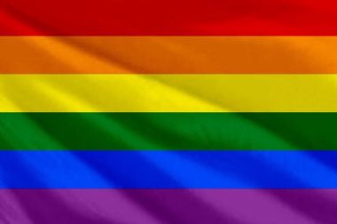 LGBT bayrağı sallıyor. LGBT bayrağı yakın plan.. Eşcinsel gökkuşağı bayrağı. Gökkuşağı bayrağı
