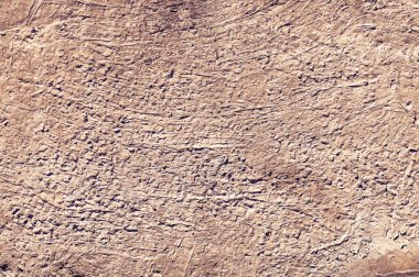 Sarı taş dokusu yakın plan. Sert sarı taş duvar. Doğal kaya dokusu