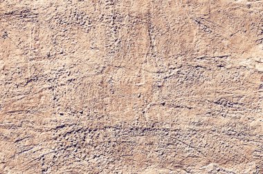 Sarı taş dokusu yakın plan. Sert sarı taş duvar. Doğal kaya dokusu