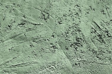 Yeşil taş dokusu yakın plan. Sert yeşil taş duvar. Doğal kaya dokusu