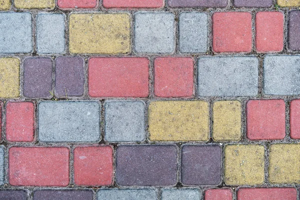 Çok renkli asfalt levhaların yüzeyi. Güzel desen, arka plan yakın plan