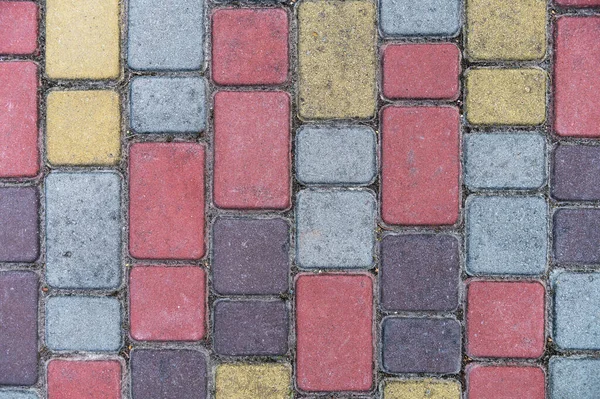 Çok renkli asfalt levhaların yüzeyi. Güzel desen, arka plan yakın plan