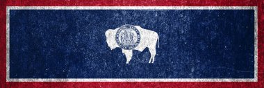 Wyoming eyaleti grunge bayrağının bayrağı. Metal bir yüzeyde Kirli Wyoming eyalet bayrağı.