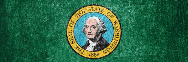Banner of the Washington State grunge flag. Dirty Washington State flag on a metal surface.
