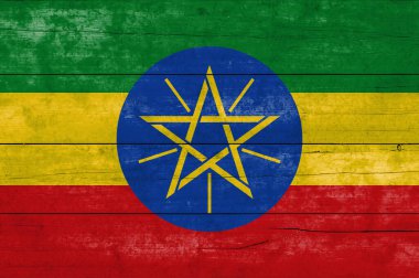 Ahşap bir yüzeyde Etiyopya bayrağı. Grunge Etiyopya bayrağının bayrağı. 