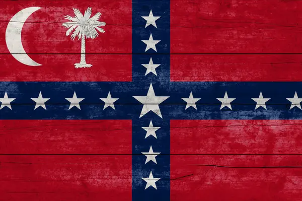 South Carolina State flag on a wooden surface. Banner of the grunge South Carolina State flag.