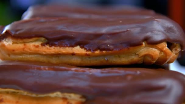 French Pastry Glazed Eclairs Cream Chocolate Eclairs Rotate Circle Selective — Stock Video