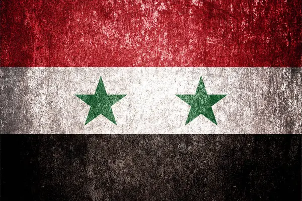 Grunge Suriye bayrağını kapatın. Metal yüzeyde kirli Suriye bayrağı.