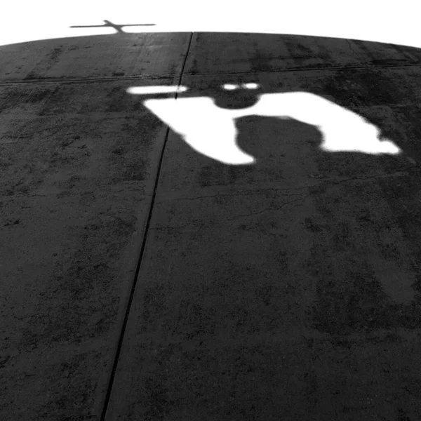 The shadow of the San Elizario Mission bell tower, on the El Paso Mission Trail, in San Elizario, Texas.