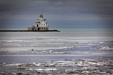 A cold January morning at the lighthouse, with ice in the harbor, at Manitowoc, Wisconsin.
