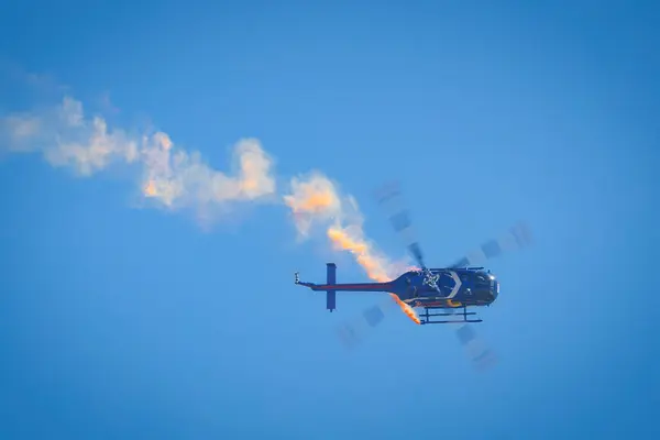 stock image Red Bull's Aerobatic Helicopter flown by pilot Aaron Fitzgerald at America's Airshow 2023 in Miramar, California.