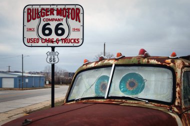 The Bulger Motor Company on historic Route 66 since 1946 at Carterville, Missouri. clipart