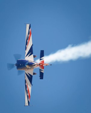 Australian aerobatic champion, Aarron Deliu, performs at the 2024 Legacy of Liberty Airshow at Holloman Air Force Base near Alamogordo, New Mexico. clipart