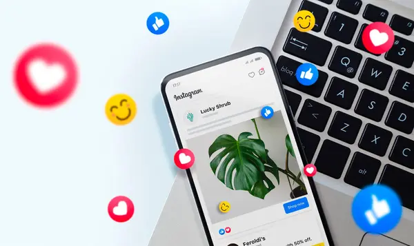 Meta reklamları cep telefonu ekranında. Etrafta emojiler varken Instagram 'da reklam örneğini gösteren akıllı telefon. Reklam konsepti. Rosario, Arjantin - 20 Mart 2025.