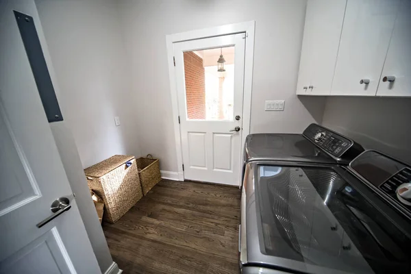 White Laundry Room Wood Floors Silver Washer Dryer — Stock Photo, Image