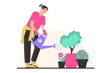 Genç bir adam saksıdaki çiçekleri sular.