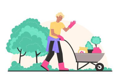 Bahçe elbiseli genç bir adam saksı bitkileri ve gübrelerle dolu bir araba taşıyor.