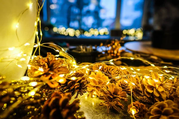 Christmas decorations and lights in a cozy home. Christmas spirit. Defocused. High quality photo