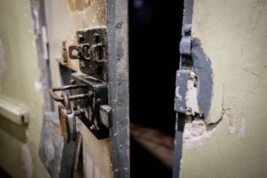 Riga, Latvia - September 26, 2025: KGB Museum interior in The Corner House in Riga. Underground prison, interrogation rooms and administrative office. High quality photo