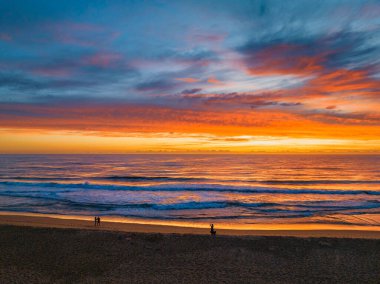 Early morning colourful aerial seascape with clouds at Terrigal Lagoon and Beach on the Central Coast, NSW, Australia.