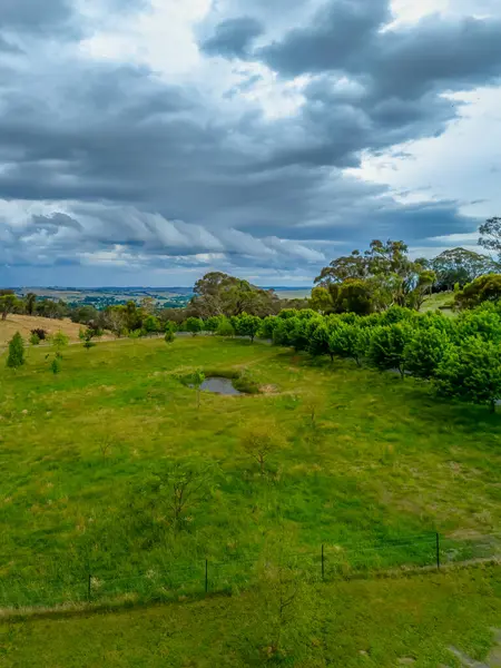 stock image Early evening Summer Storm approaching over the fields on a rural property at Blayney in the Central West of NSW, Australia.