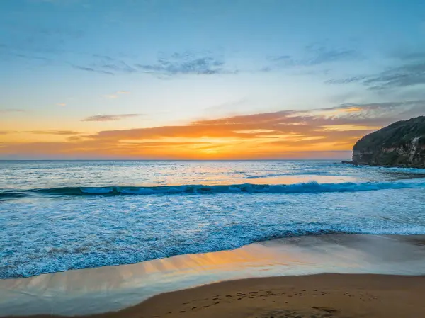 stock image Aerial sunrise with pretty clouds  and waves at  Macmasters Beach on the Central Coast, NSW, Australia.