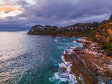 Aerial sunrise over Whale Beach in the Northern Beaches region of Sydney, NSW, Australia. clipart