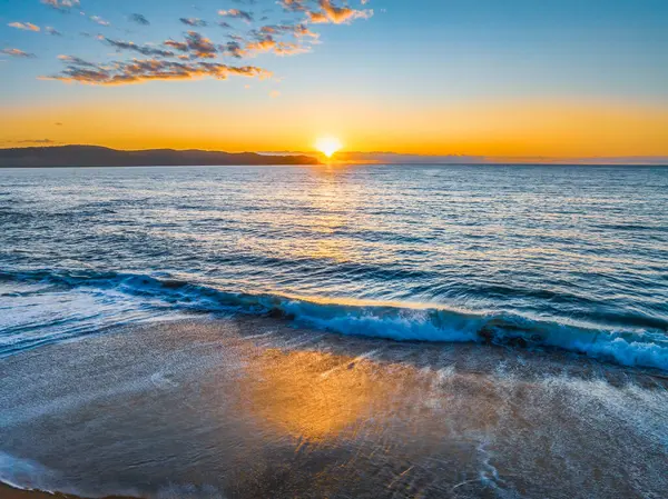 stock image Sunrise at the seaside from North Pearl Beach on the Central Coast, NSW, Australia.