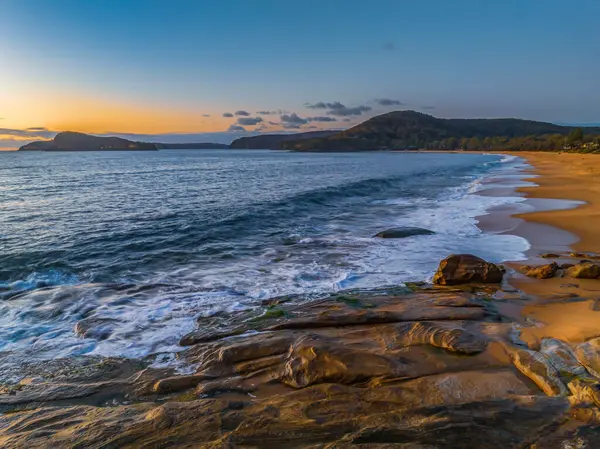 stock image Sunrise at the seaside from North Pearl Beach on the Central Coast, NSW, Australia.