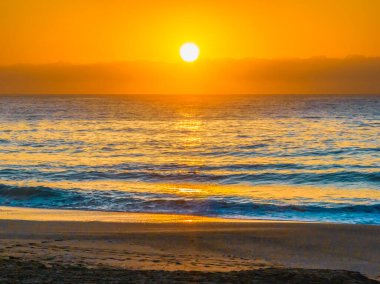 Central Coast, NSW, Avustralya 'daki Killcare Sahili' nde gün doğumu ve deniz..