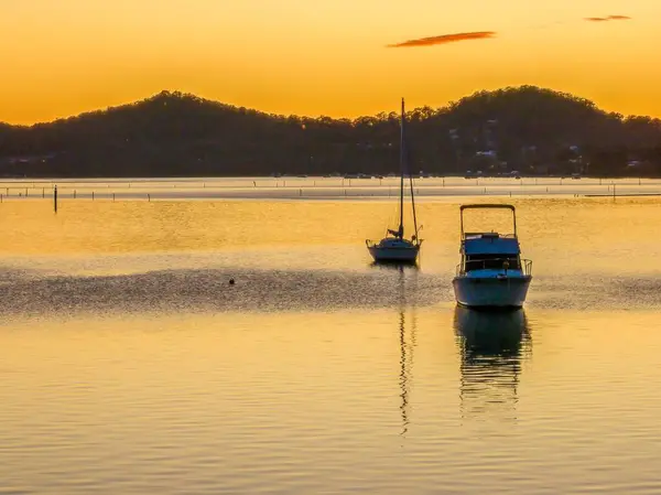 stock image Sunrise and boats on Brisbane Water at Koolewong on the Central Coast, NSW, Australia.