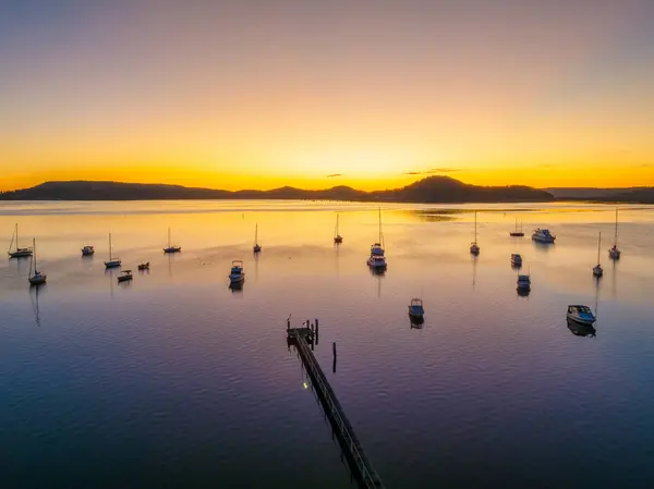 Stock image Sunrise and boats on Brisbane Water at Koolewong on the Central Coast, NSW, Australia.