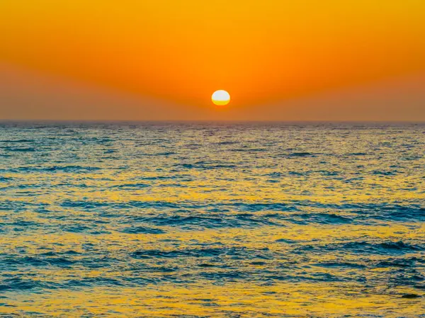 stock image Pretty aerial sunrise with sun rising on the horizon at  Macmasters Beach on the Central Coast, NSW, Australia.