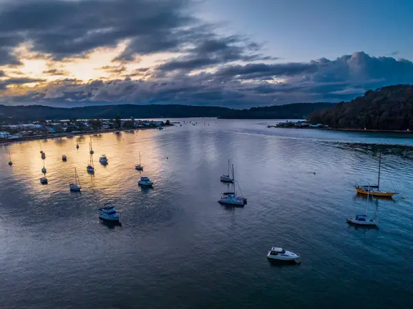 stock image Sunrise and clouds over Ettalong Beach on the Central Coast, NSW, Australia.