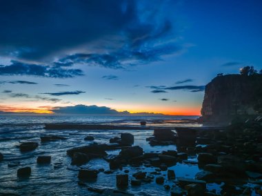 Aerial sunrise seascape with clouds from The Skillion in Terrigal, NSW, Australia. clipart