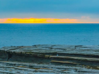 Aerial sunrise seascape with thick fog cloud at The Skillion in Terrigal, NSW, Australia. clipart